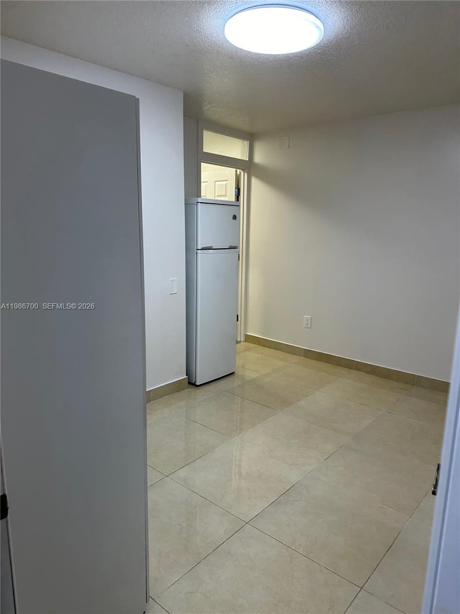 14620 Southwest 151st Terrace Miami, FL 33196 - Photo 15 of 30 a view of an empty room and window