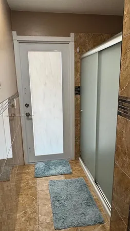 a bathroom with a sink a vanity and a mirror