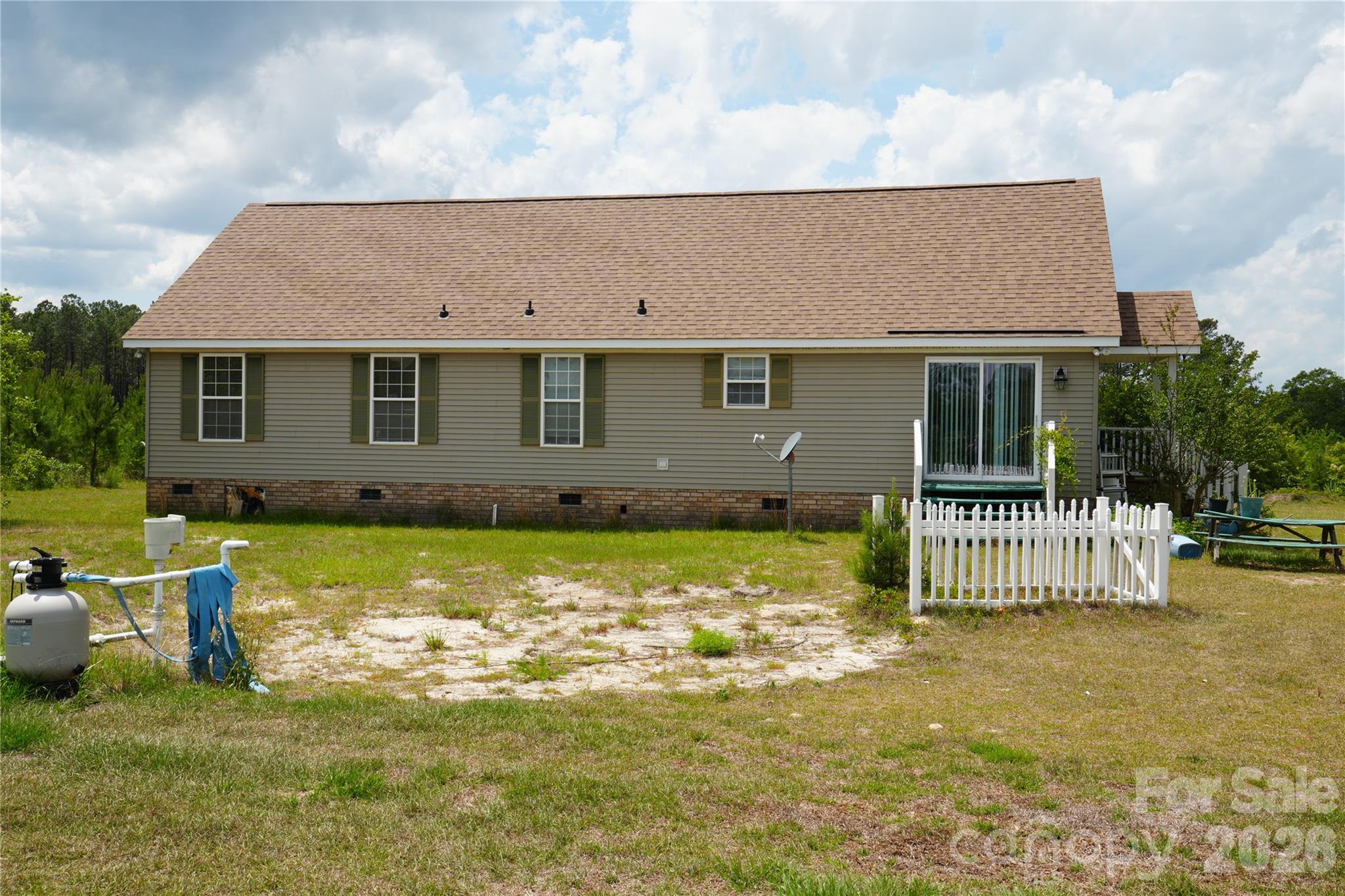 424 Press Walters Road Hartsville, SC 29550 - Photo 3 of 10 a front view of a house with a yard