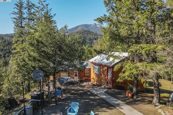 a view of a town with mountains in the background