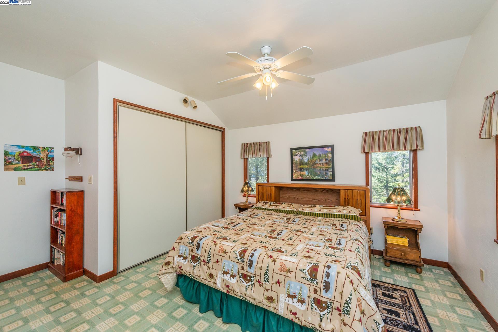 8341 East Side Road Trinity Center, CA 96091 - Photo 26 of 58 a bedroom with a large bed and a window
