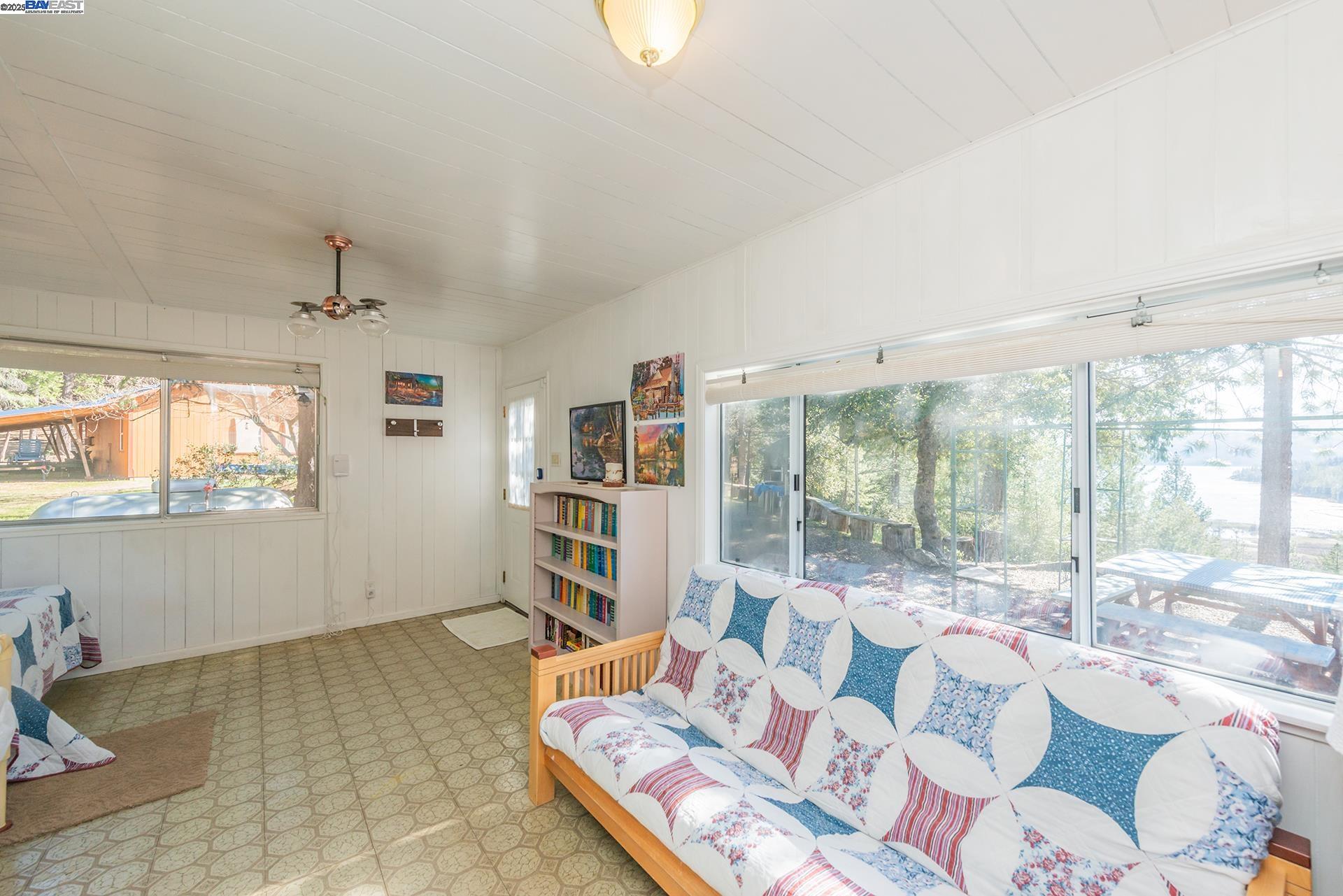 8341 East Side Road Trinity Center, CA 96091 - Photo 32 of 58 a living room with furniture and a large window