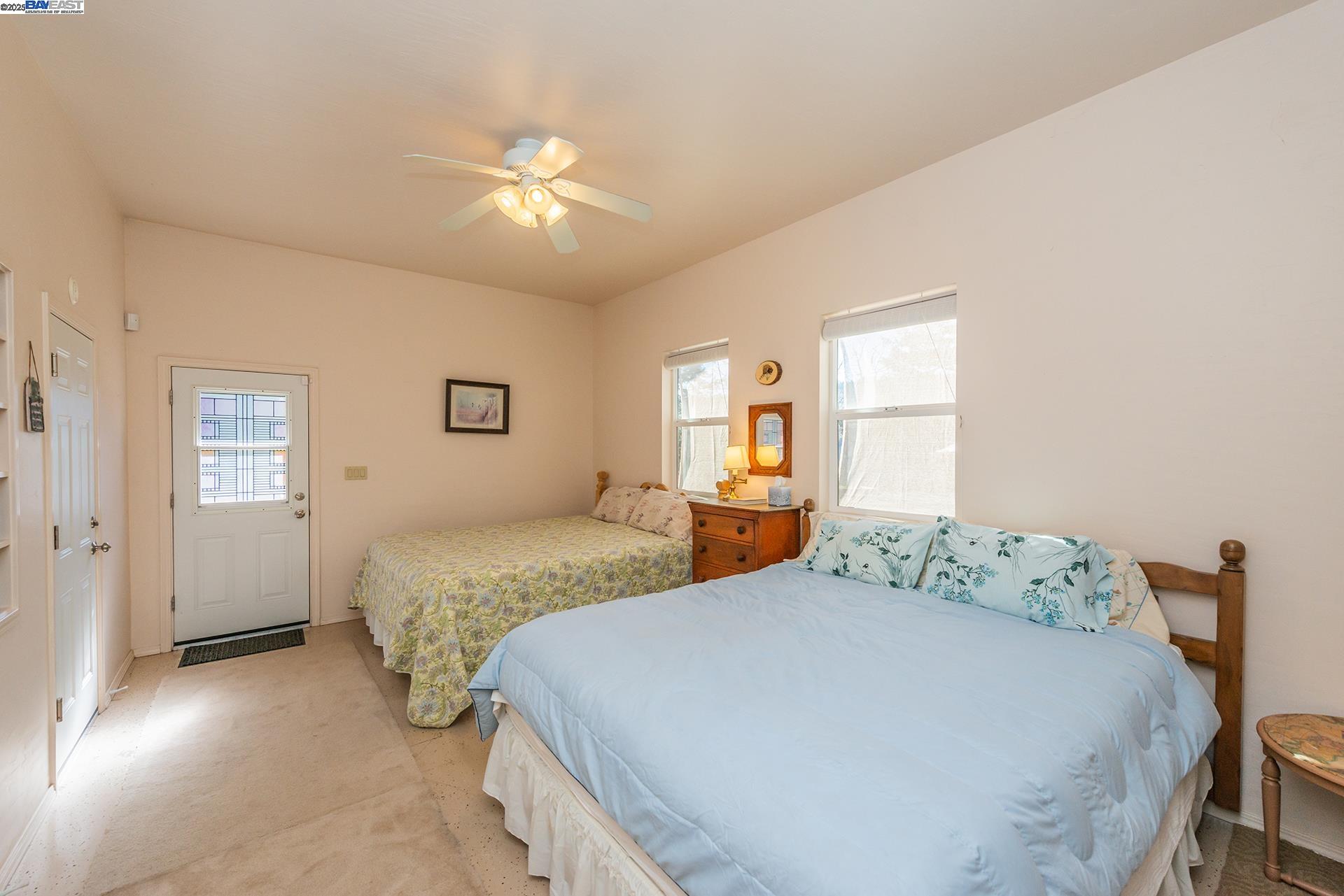 8341 East Side Road Trinity Center, CA 96091 - Photo 34 of 58 a bedroom with a large bed and a window