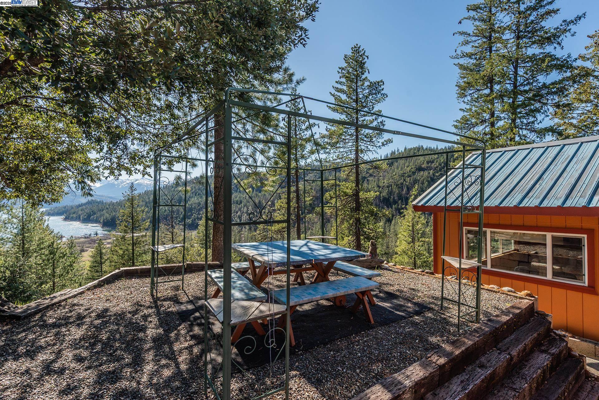 8341 East Side Road Trinity Center, CA 96091 - Photo 48 of 58 a backyard of a house with table and chairs