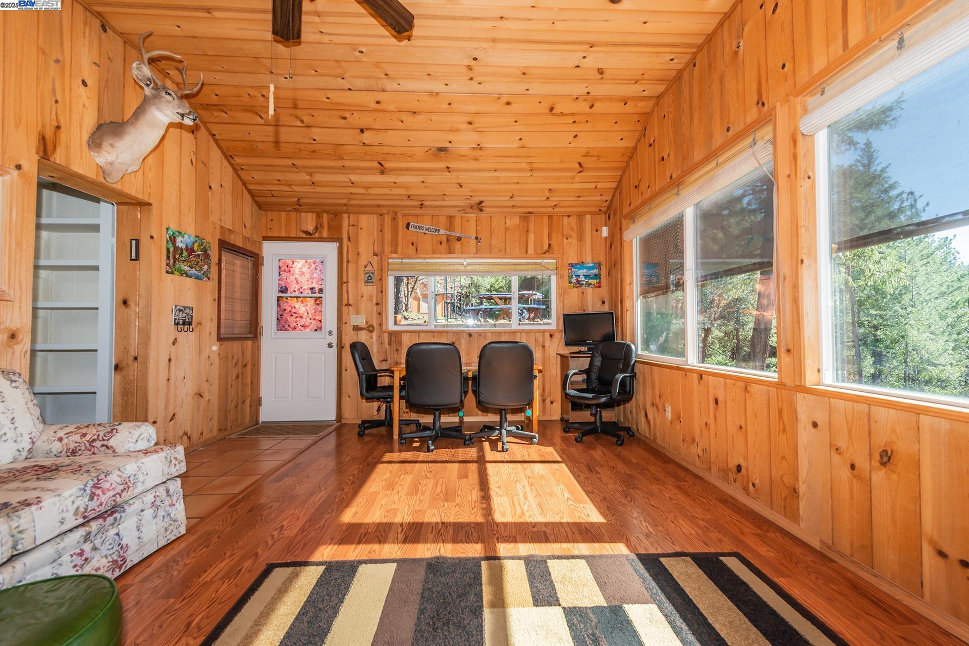 8341 East Side Road Trinity Center, CA 96091 - Photo 6 of 58 a outdoor space with wooden floor and furniture