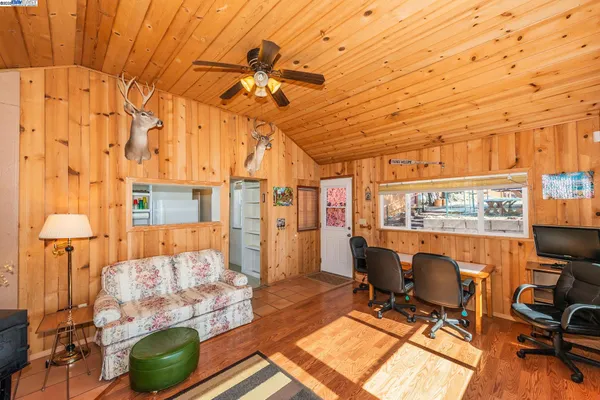 a view of balcony with furniture
