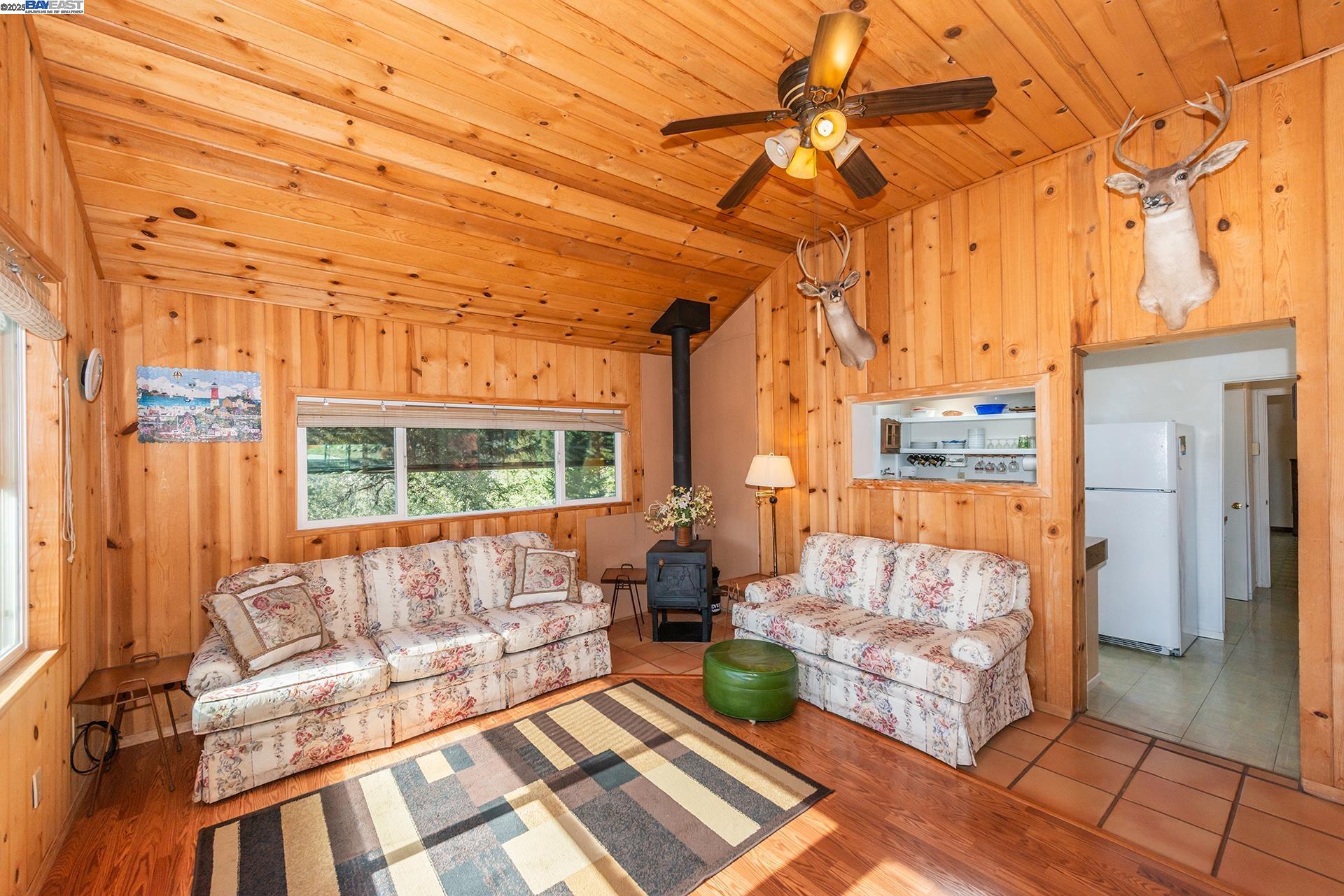 8341 East Side Road Trinity Center, CA 96091 - Photo 10 of 58 a view of a living room with a couch and a coffee table