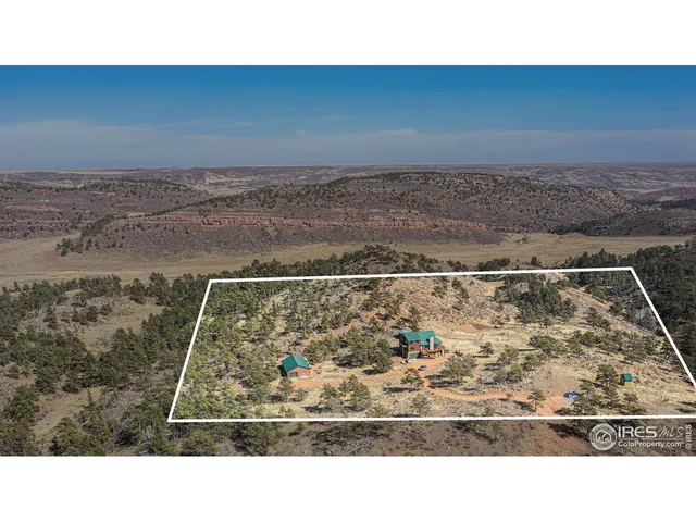 a view of a city with mountains
