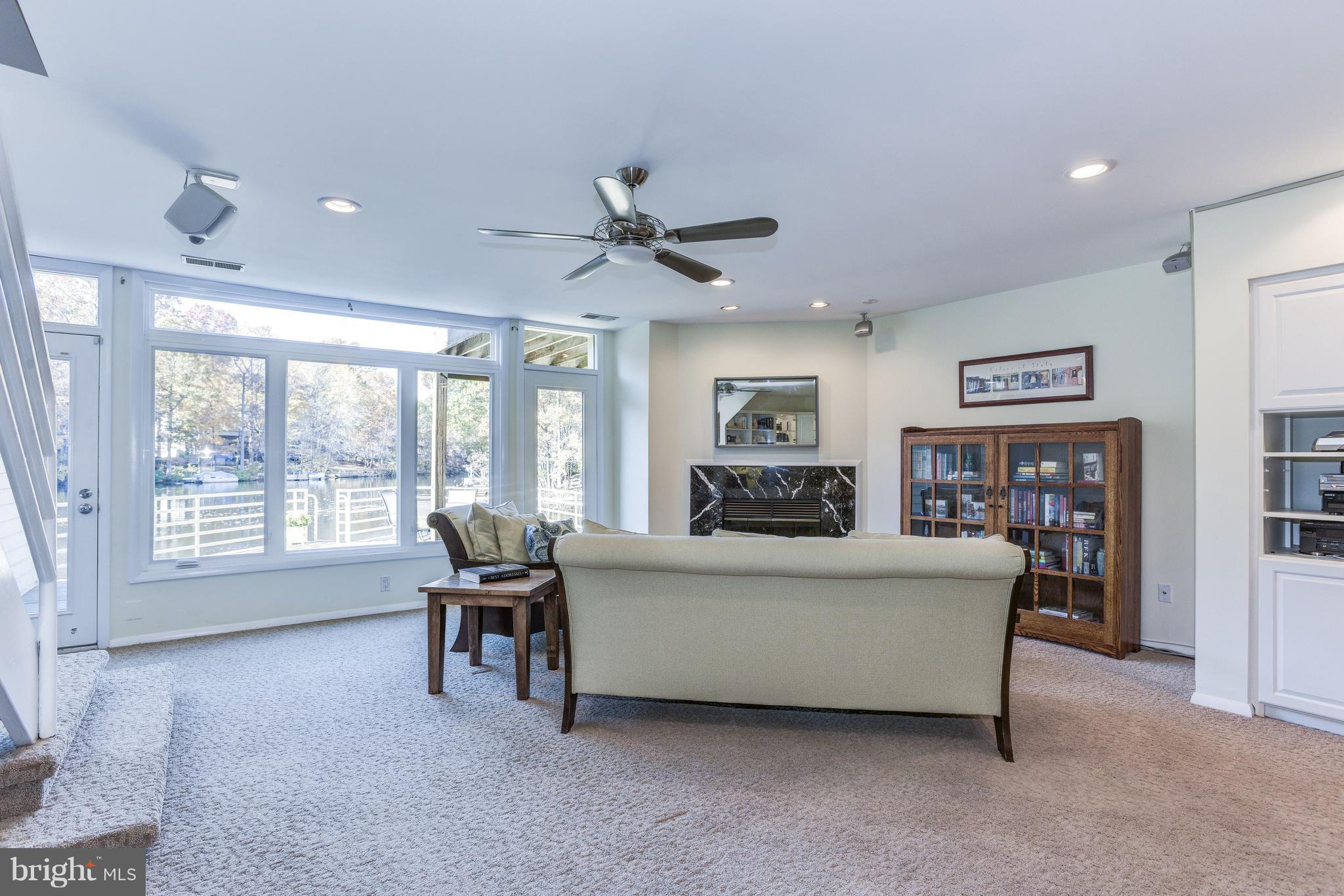 1965 Lakeport Way Reston, VA 20191 - Photo 22 of 28 a living room with furniture and a large window