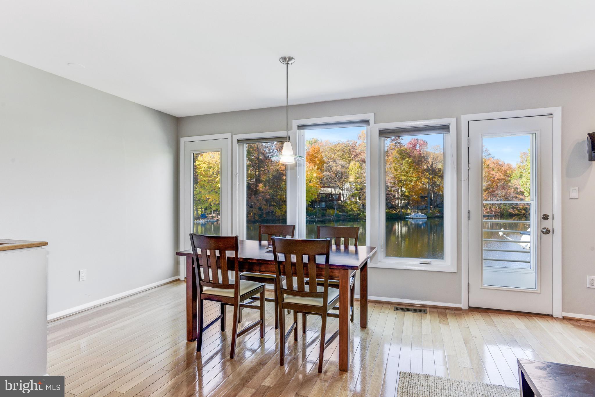 1965 Lakeport Way Reston, VA 20191 - Photo 5 of 28 a dining room with furniture window wooden floor