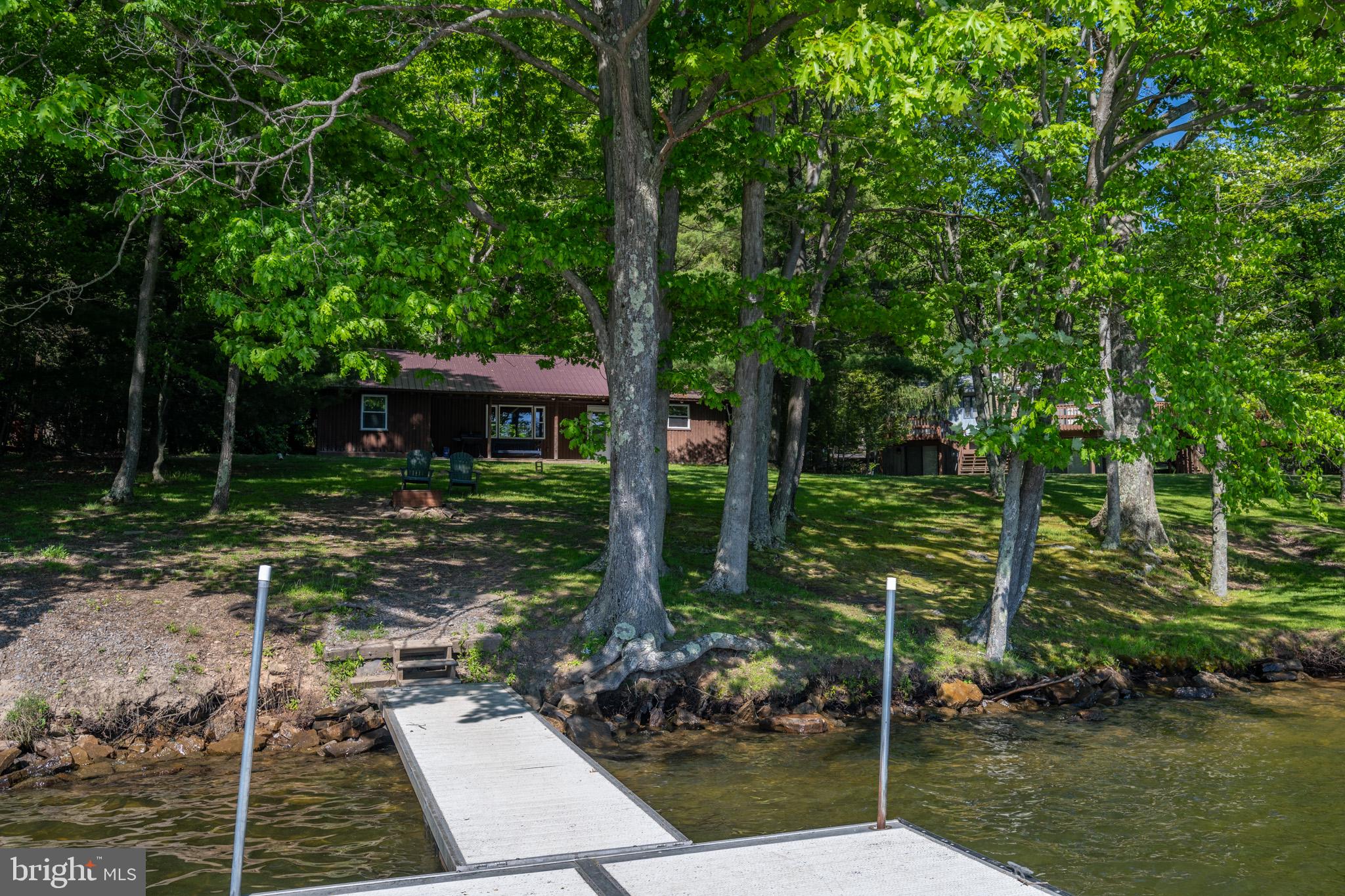 2187 State Park Road Swanton, MD 21561 - Photo 28 of 29 a view of a backyard with sitting area