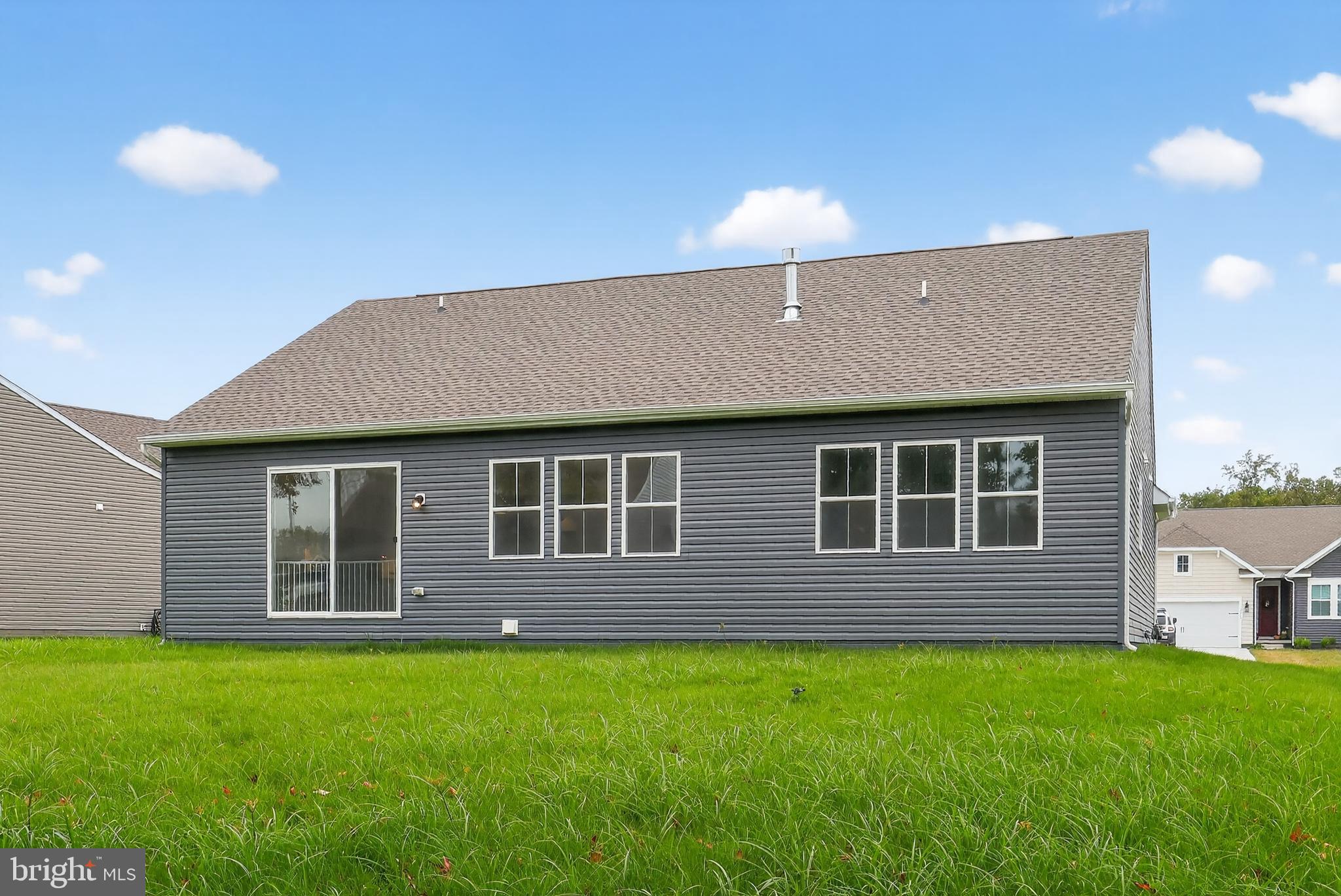 264 North Rdg Brk Drive Felton, DE 19943 - Photo 20 of 20 a front view of a house with a yard