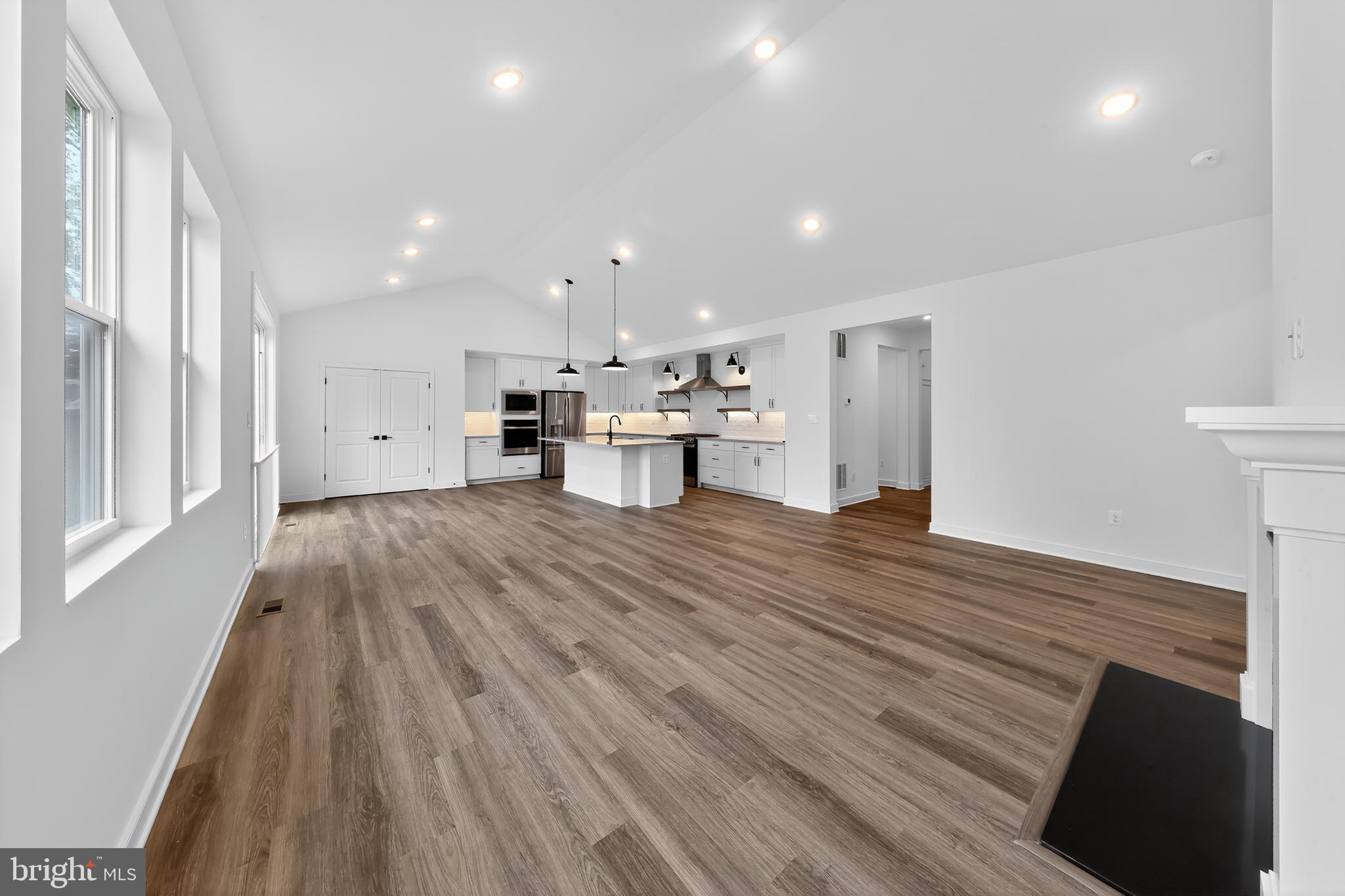 264 North Rdg Brk Drive Felton, DE 19943 - Photo 8 of 20 a view of kitchen with wooden floor and electronic appliances
