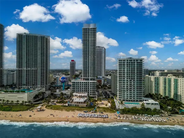 a view of a city with tall buildings