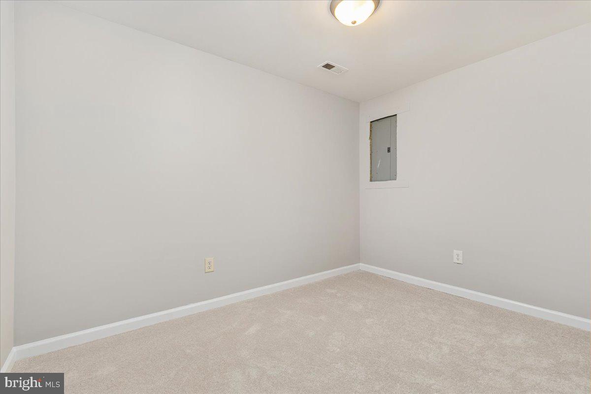 2304 High Top Road Linden, VA 22642 - Photo 20 of 42 an empty room with a empty space and a window