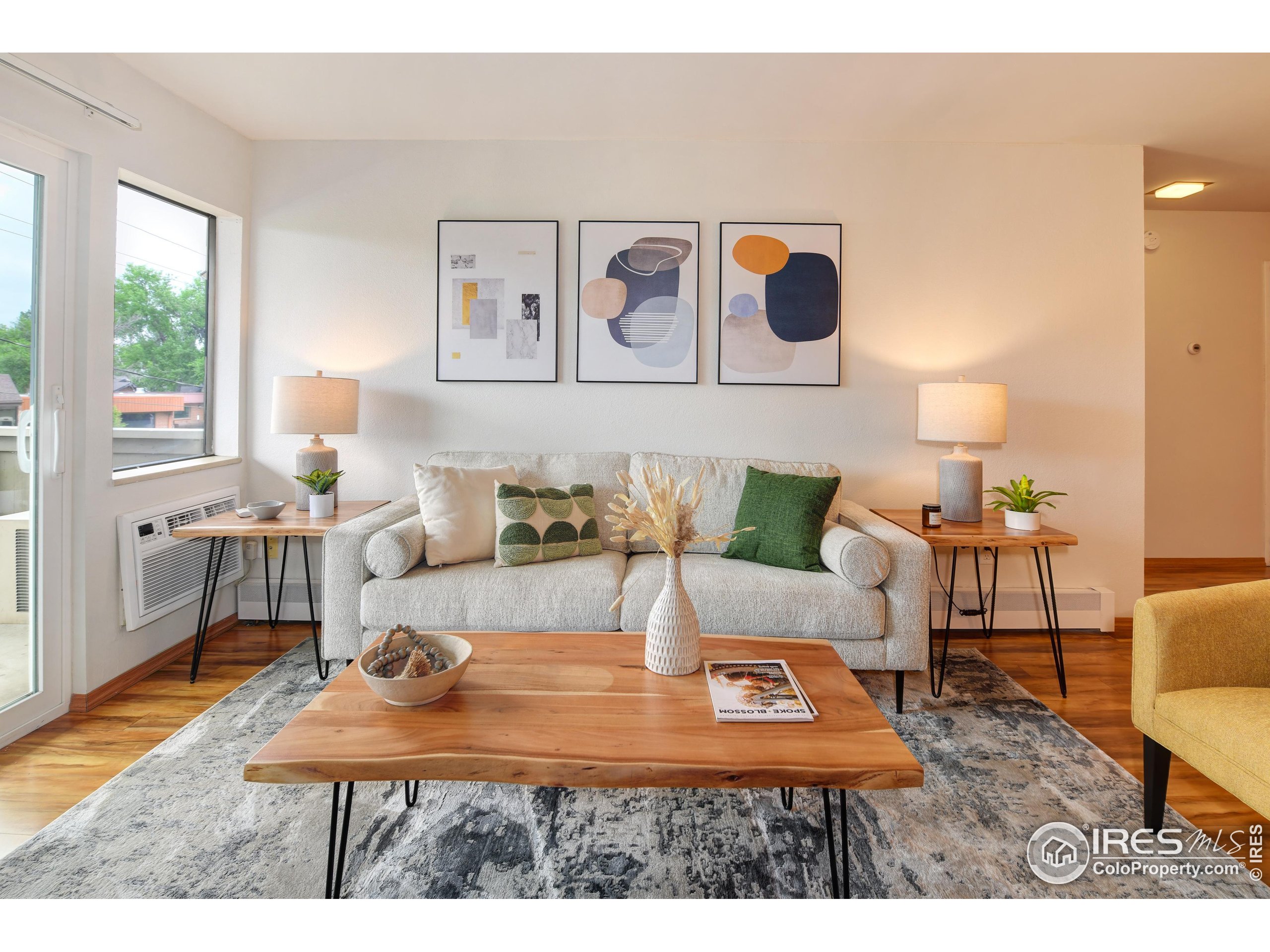 3240 Iris Avenue, Unit 201 Boulder, CO 80301 - Photo 2 of 27 a living room with furniture and wooden floor
