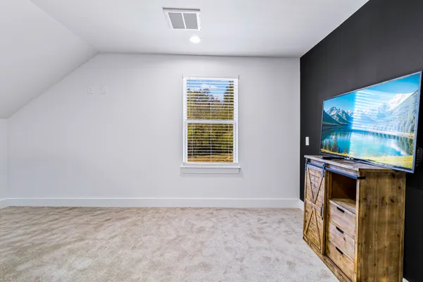 a view of livingroom with washer and dryer