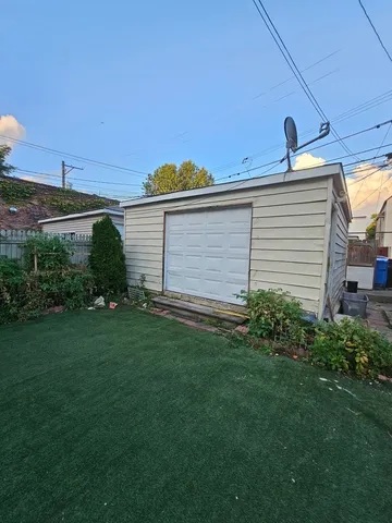 a view of a back yard of the house