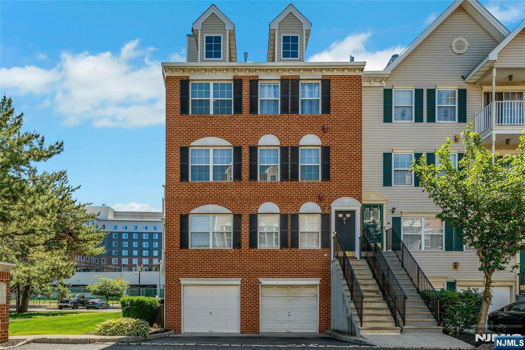 72 Marrow Street, Unit 3101 Newark, NJ 07103 - Photo 1 of 20 a front view of residential houses with yard