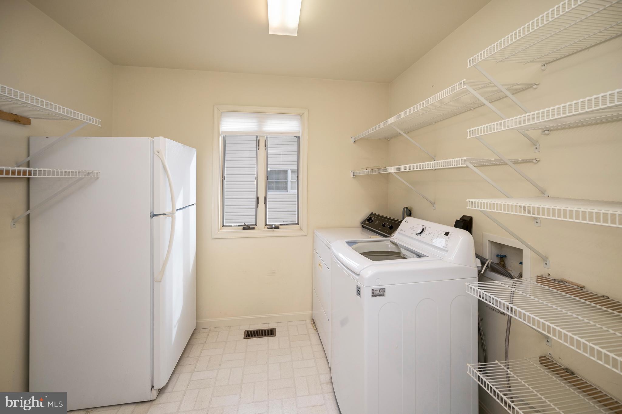 105 Ramsay Road Locust Grove, VA 22508 - Photo 16 of 60 Laundry room conveniently located off the kitchen
