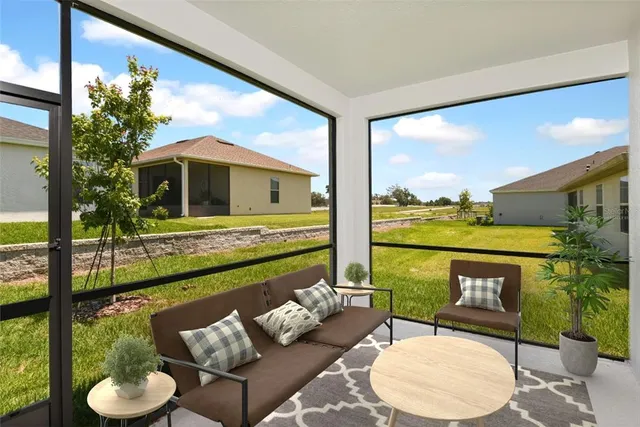 a view of a patio with couches chairs and potted plants