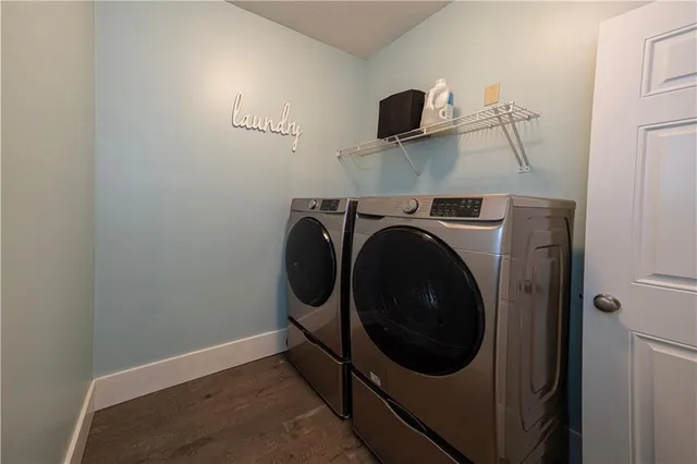 a utility room with dryer and washer