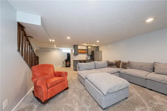 a living room with furniture and a couch