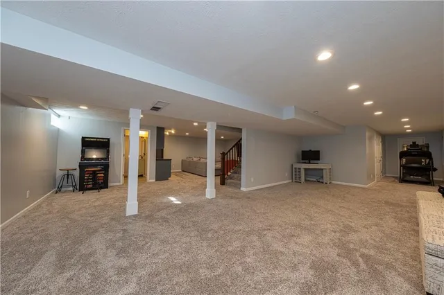 a view of a livingroom with a staircase