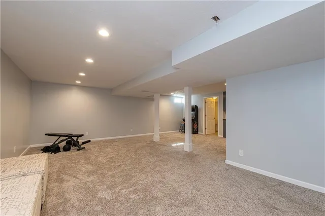 a front view of a house with sitting area