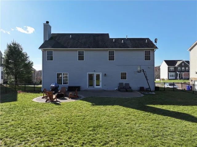 a view of a lake with a yard