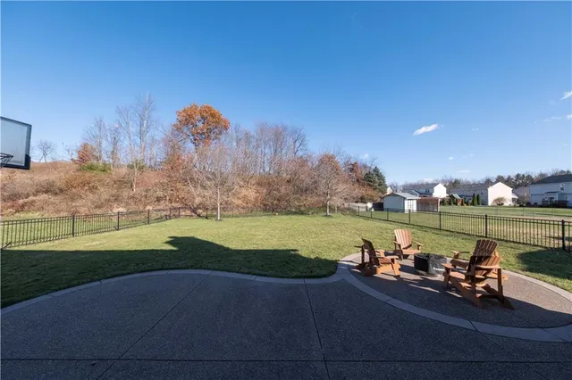 a view of a park with large trees