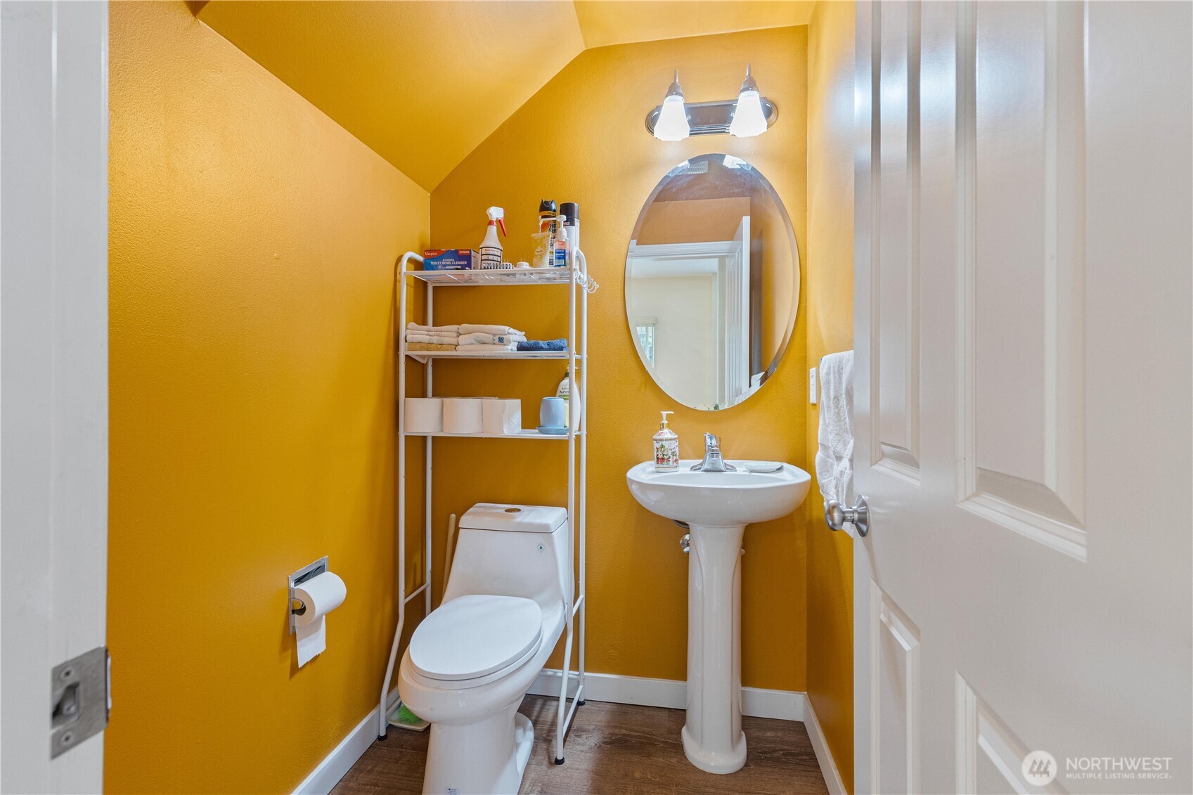 28104 Maple Ridge Way Southeast Maple Valley, WA 98038 - Photo 13 of 26 a bathroom with a toilet and a mirror