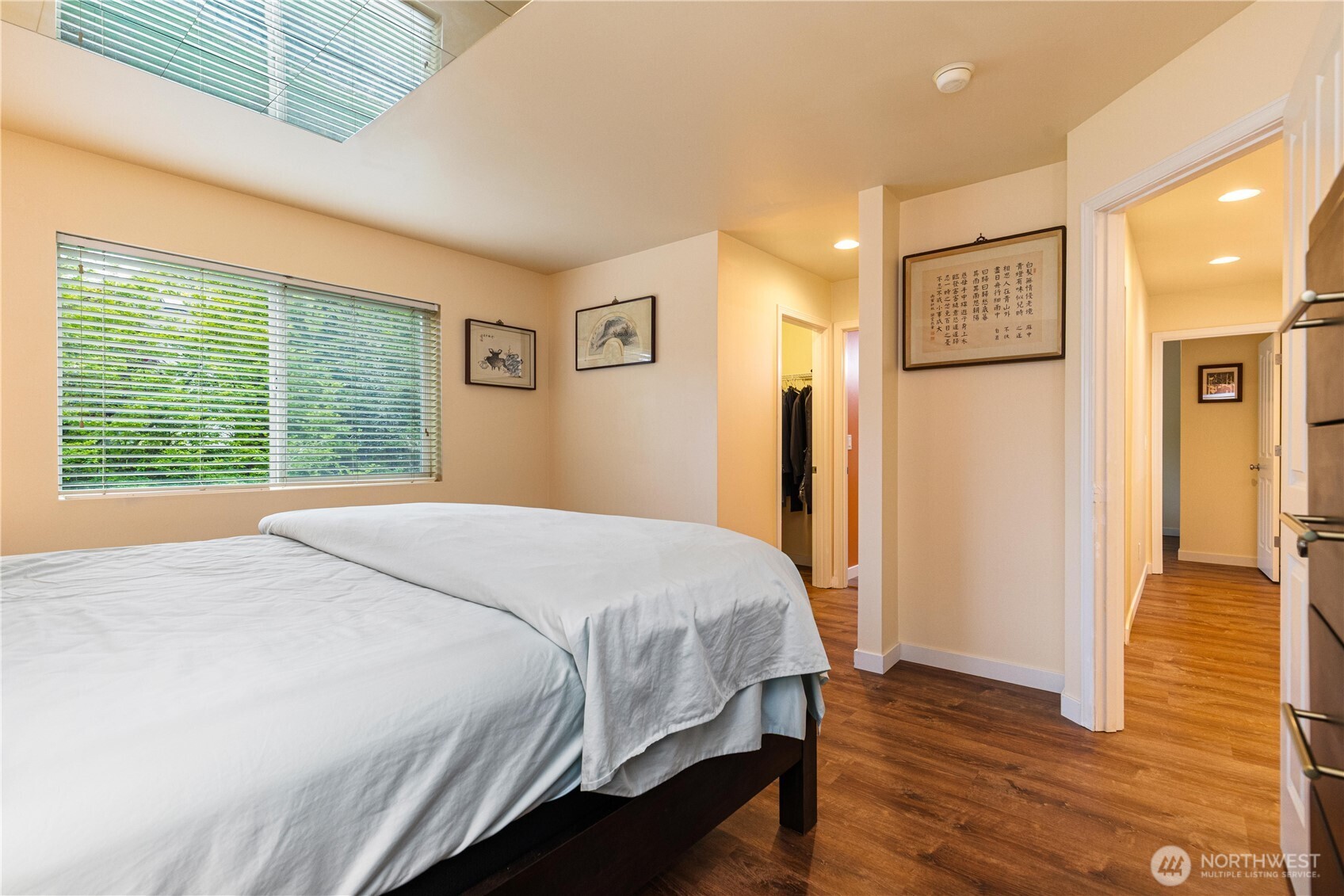 28104 Maple Ridge Way Southeast Maple Valley, WA 98038 - Photo 16 of 26 a bedroom with a bed and a large window