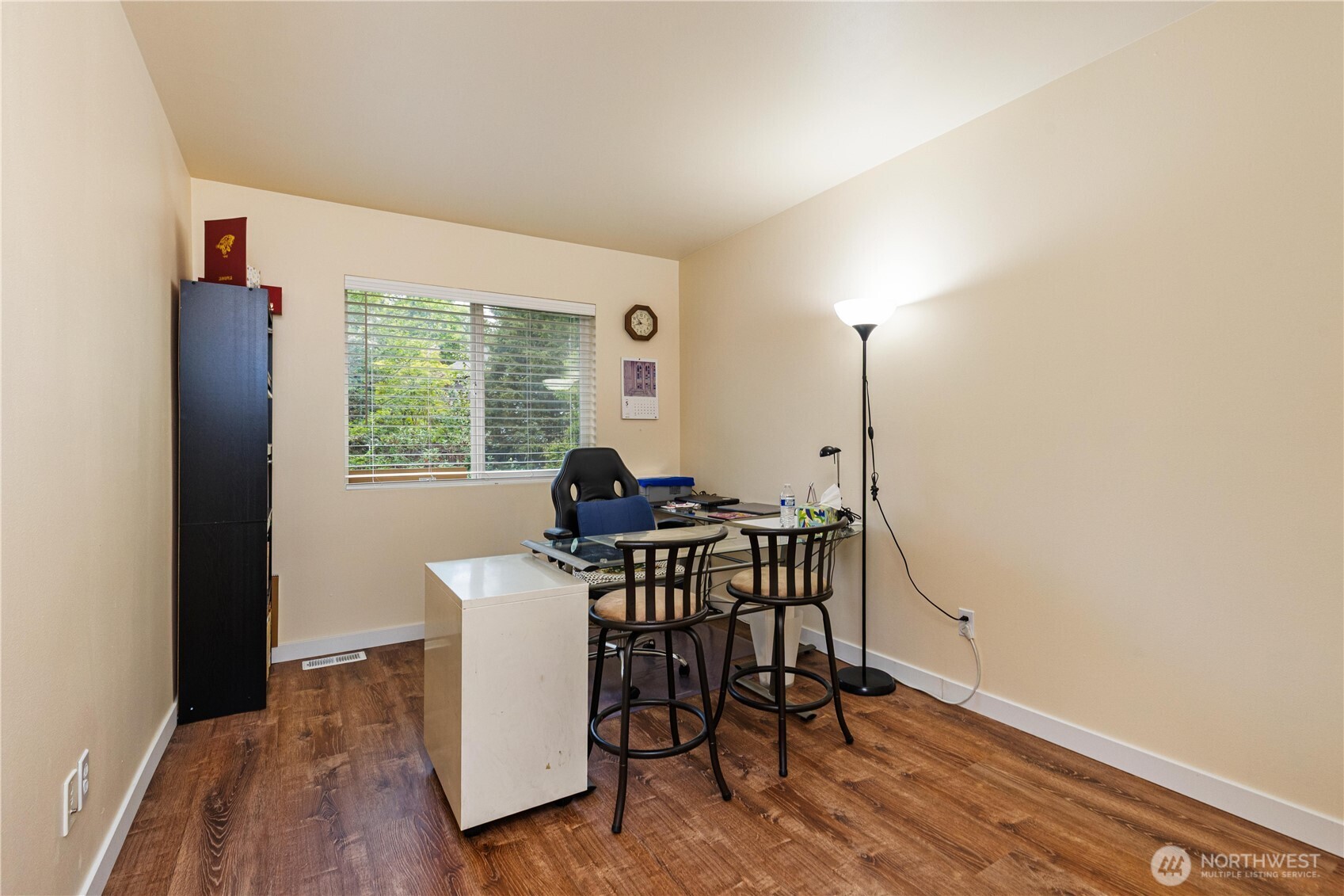 28104 Maple Ridge Way Southeast Maple Valley, WA 98038 - Photo 18 of 26 a view of a workspace with furniture and a window