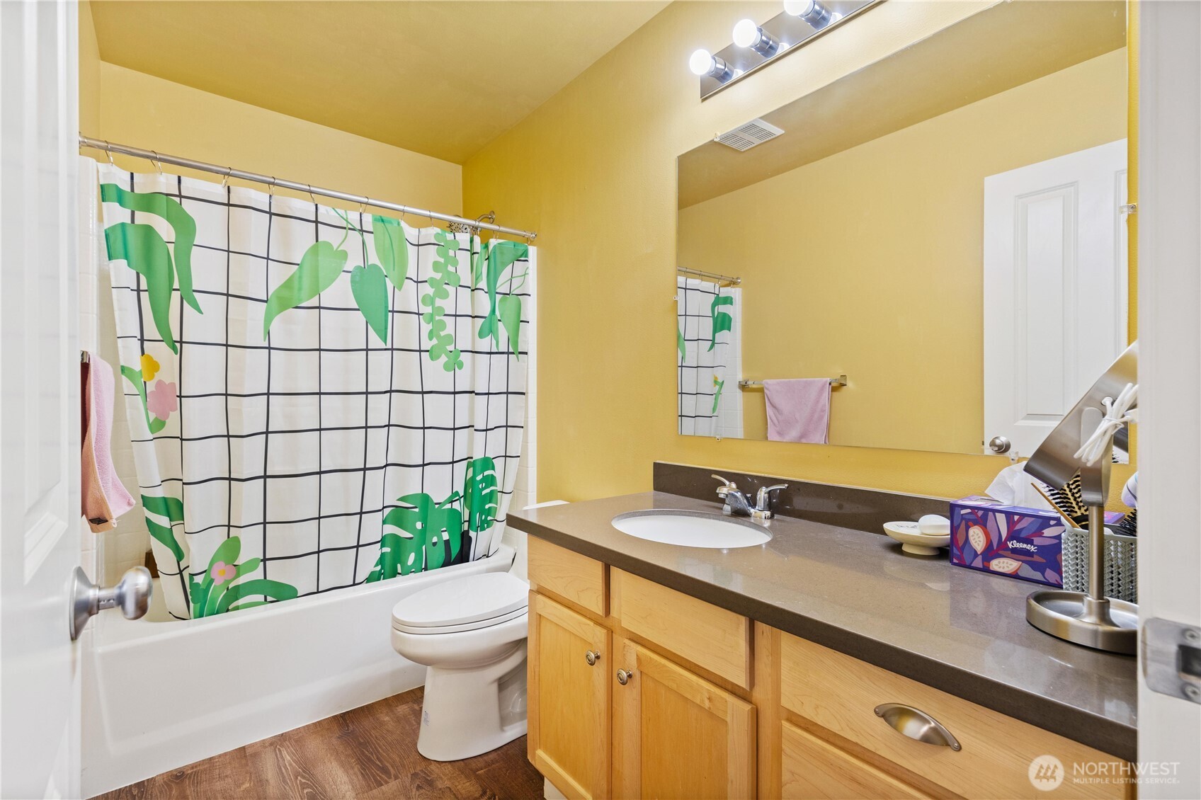 28104 Maple Ridge Way Southeast Maple Valley, WA 98038 - Photo 21 of 26 a bathroom with a granite countertop sink a toilet and shower