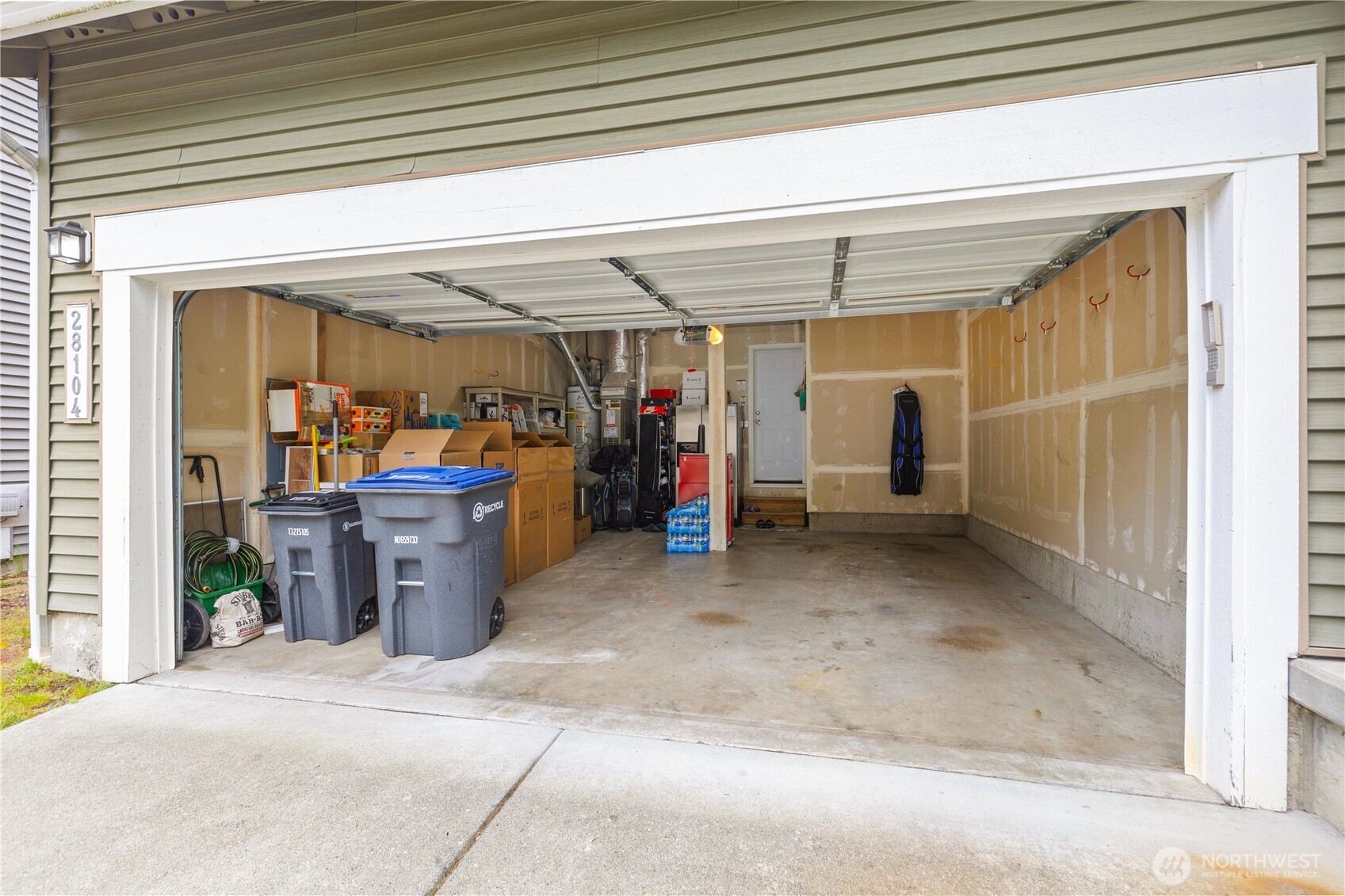 28104 Maple Ridge Way Southeast Maple Valley, WA 98038 - Photo 24 of 26 a view of a garage