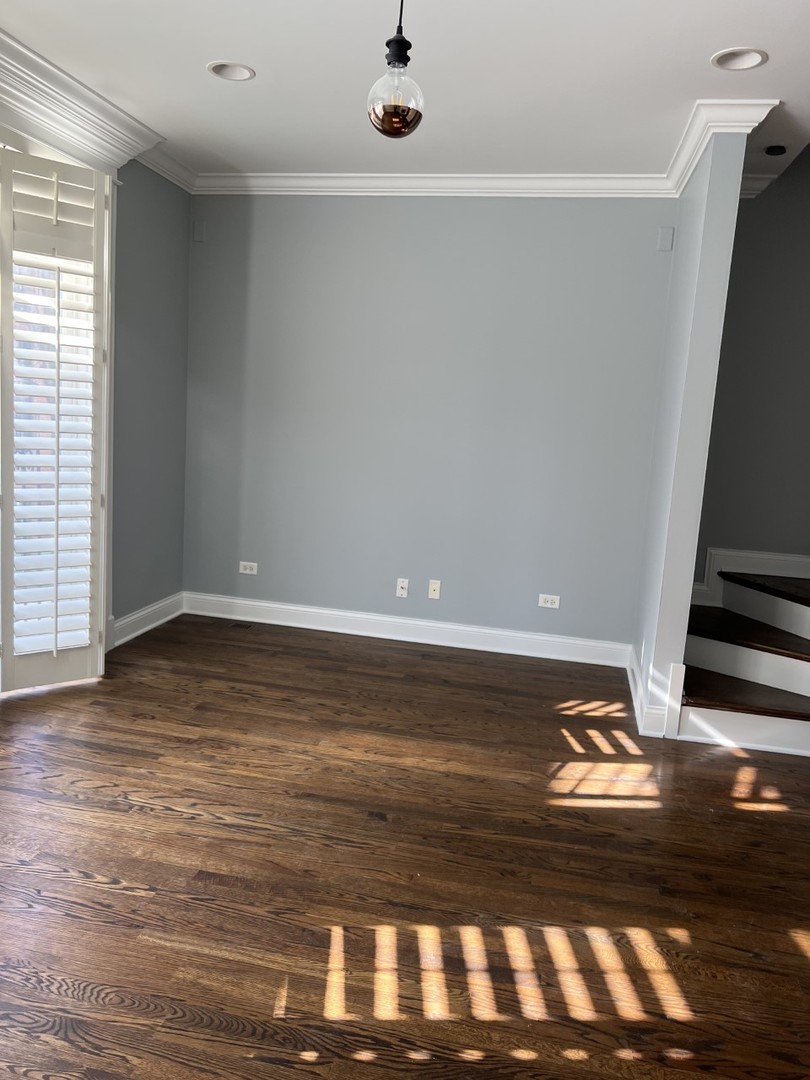 Undisclosed Address Chicago, IL 60614 - Photo 11 of 22 a view of empty room with wooden floor