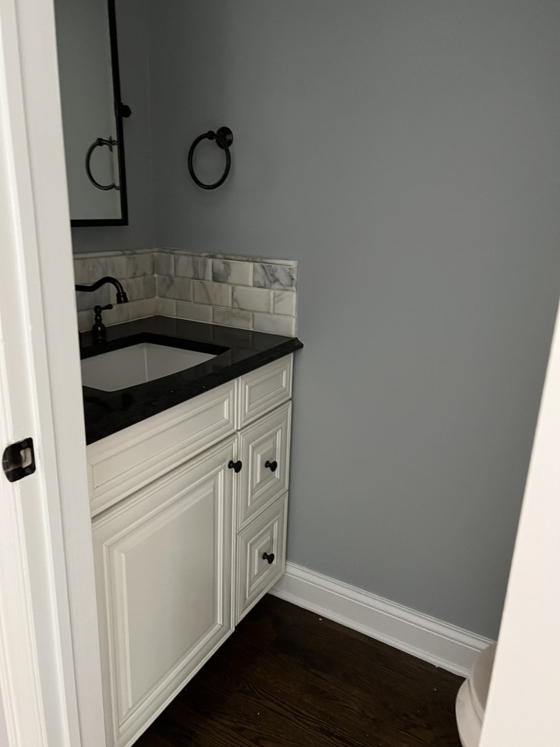 Undisclosed Address Chicago, IL 60614 - Photo 13 of 22 a kitchen with a sink and cabinets