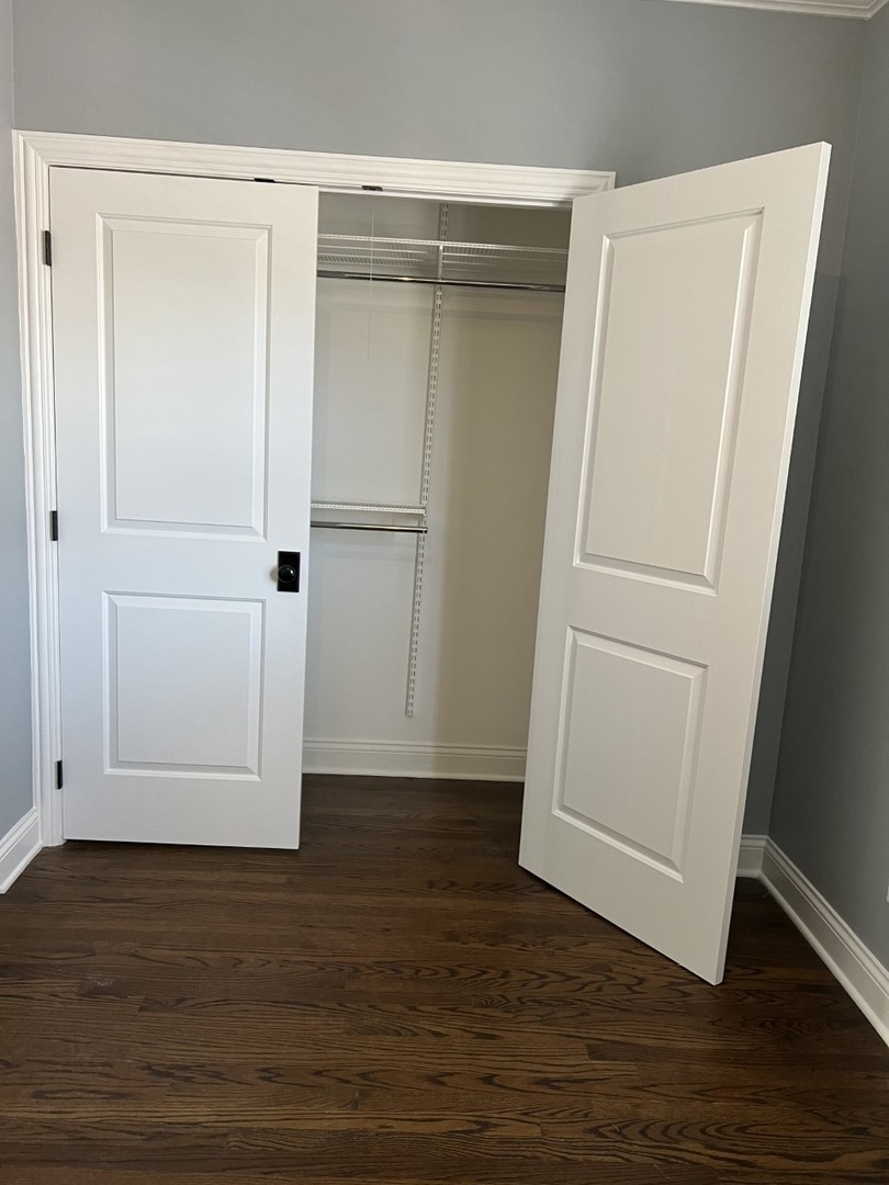 Undisclosed Address Chicago, IL 60614 - Photo 20 of 22 an empty room with wooden floor