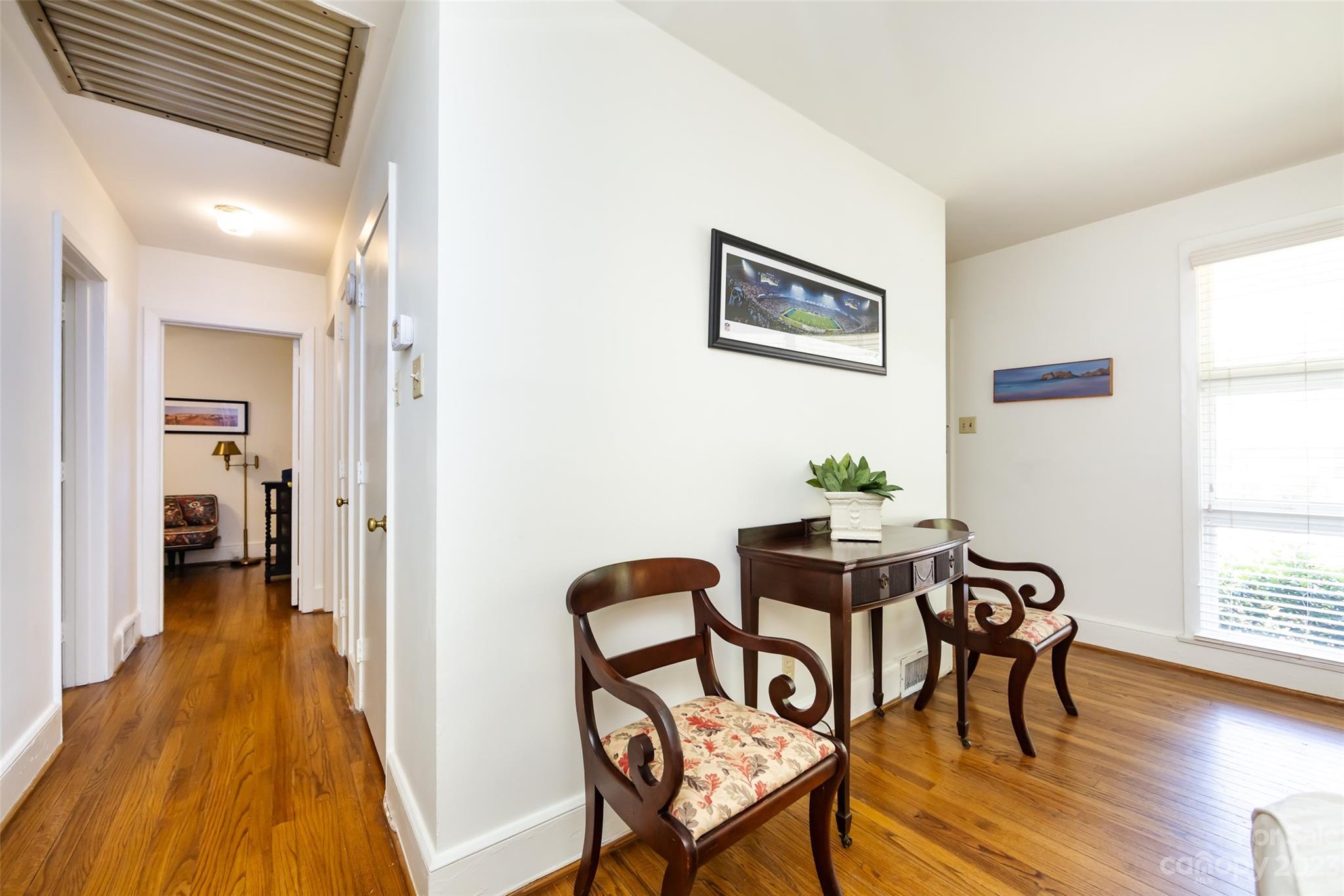 1011 Andover Road Charlotte, NC 28211 - Photo 18 of 29 a view of a dining room with furniture and wooden floor