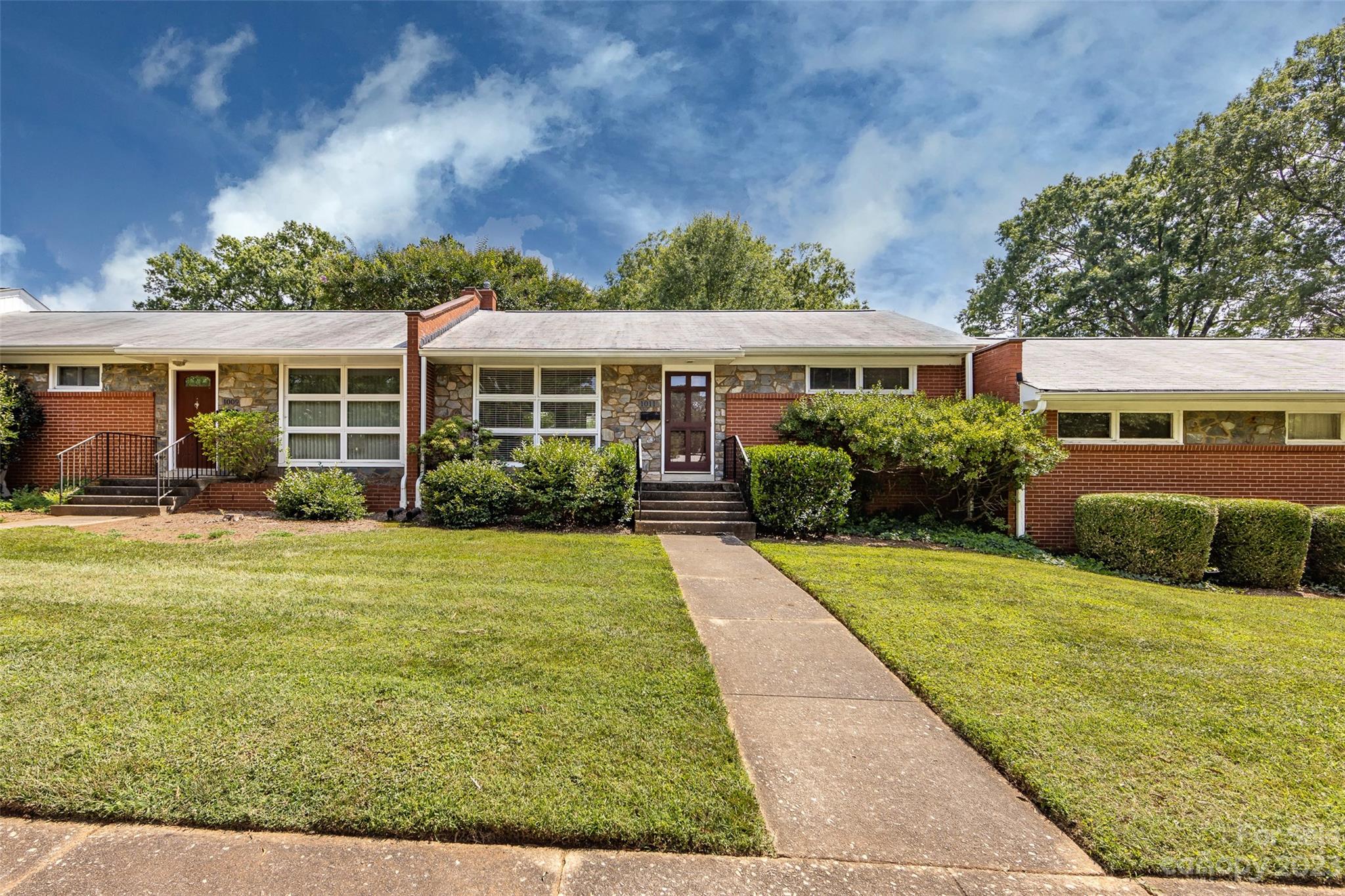 1011 Andover Road Charlotte, NC 28211 - Photo 2 of 29 a front view of house with yard and green space