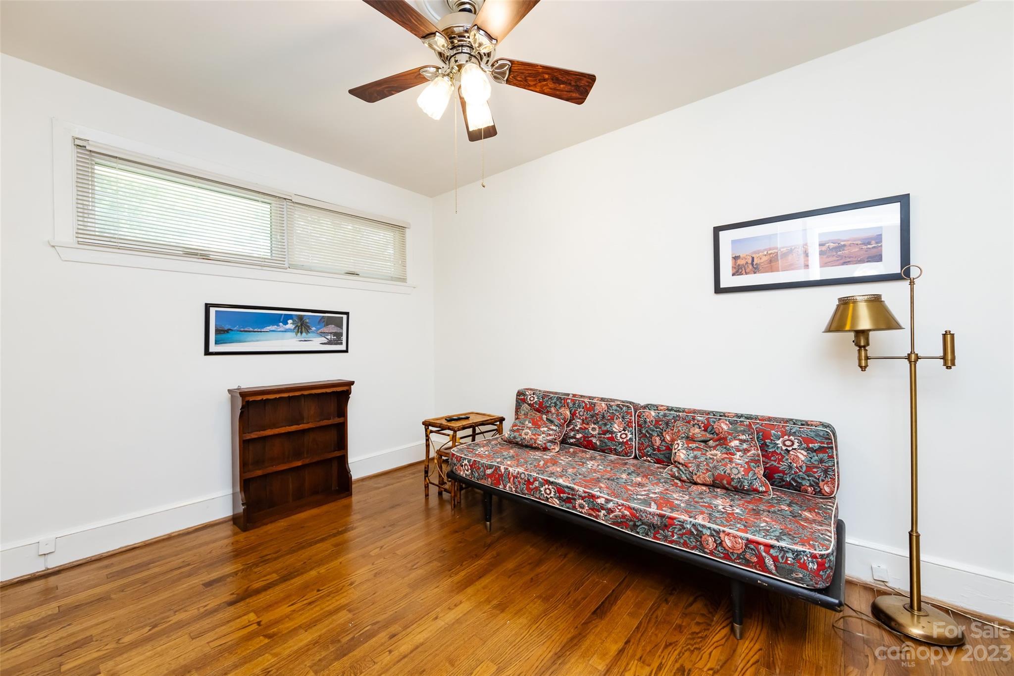 1011 Andover Road Charlotte, NC 28211 - Photo 25 of 29 a living room with furniture and a wooden floor