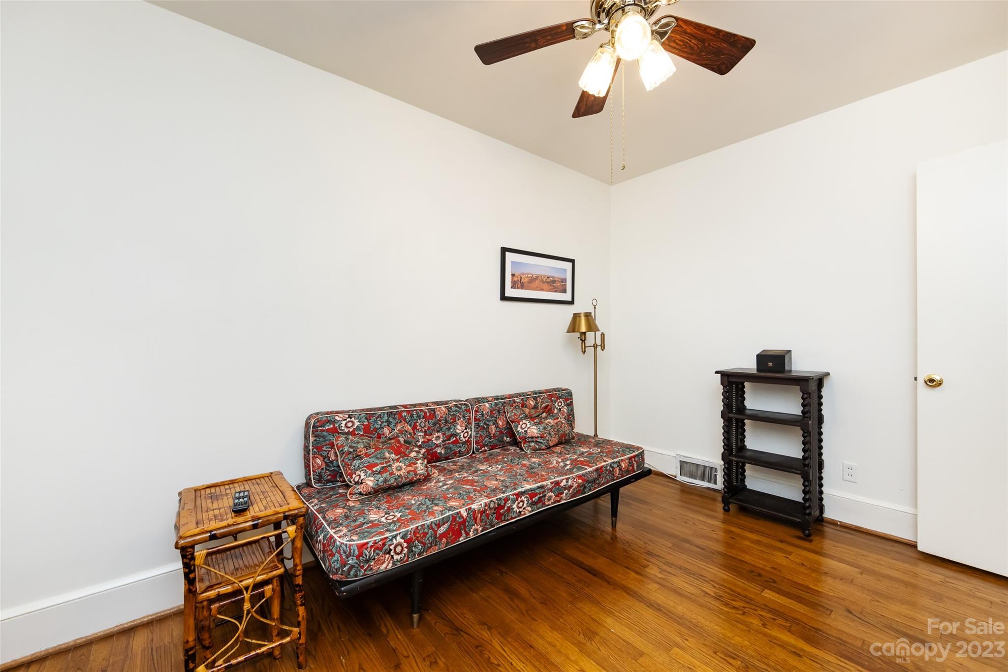 1011 Andover Road Charlotte, NC 28211 - Photo 26 of 29 a living room with furniture and a wooden floor