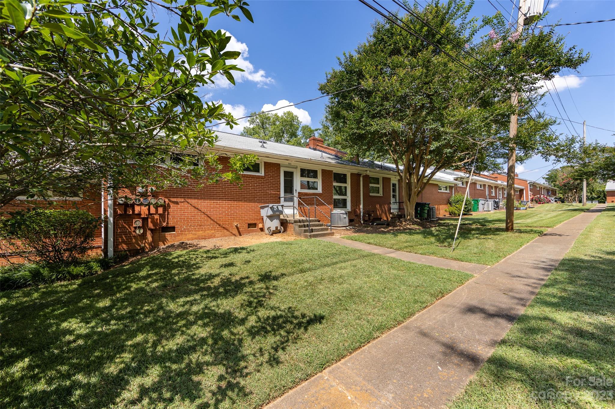 1011 Andover Road Charlotte, NC 28211 - Photo 29 of 29 a view of a house with backyard and a tree
