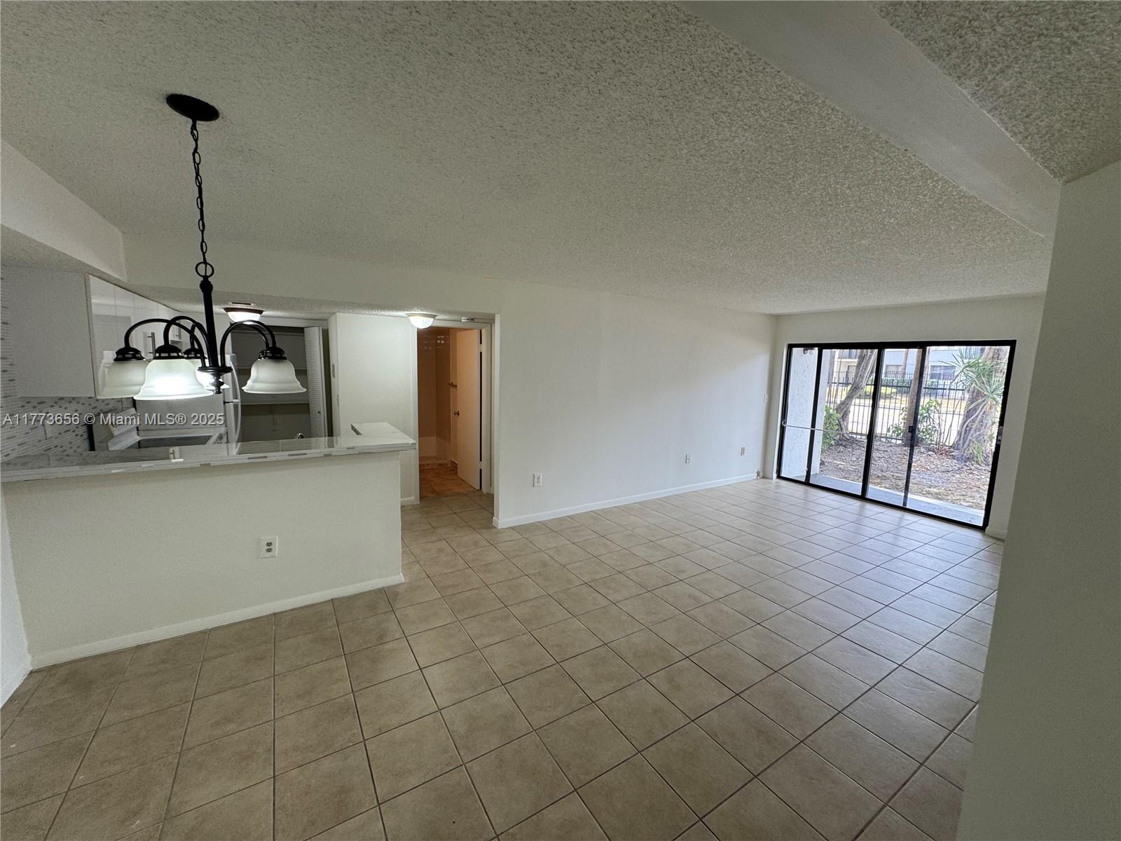 7135 Northwest 179th Street, Unit 110 Hialeah, FL 33015 - Photo 2 of 12