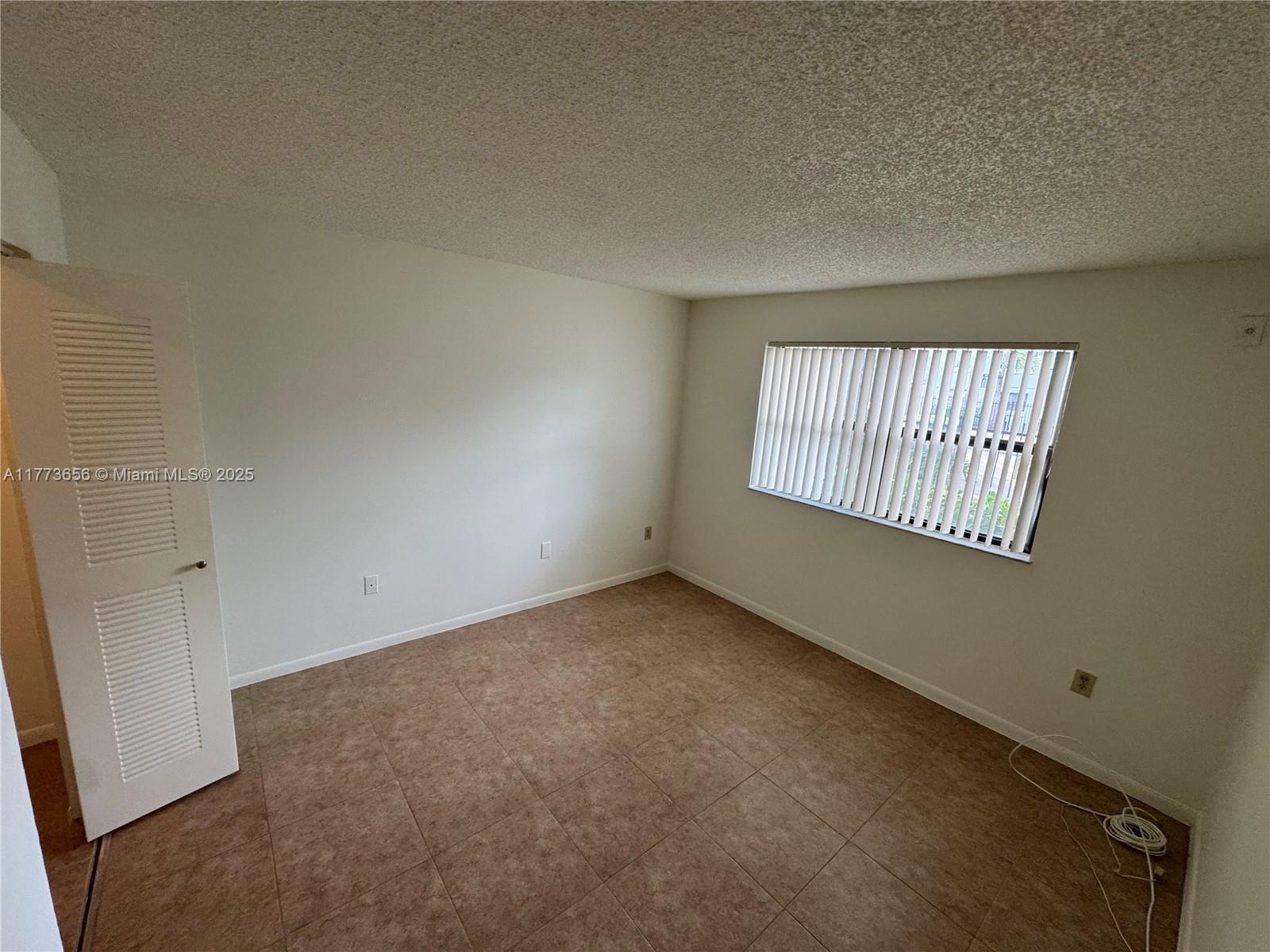 7135 Northwest 179th Street, Unit 110 Hialeah, FL 33015 - Photo 8 of 12