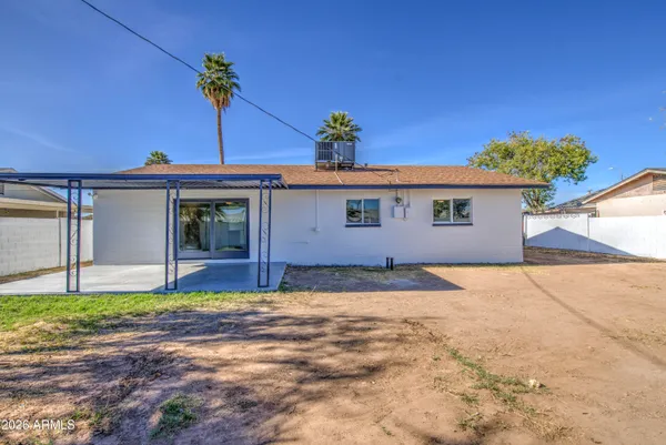 a very nice looking house with a yard