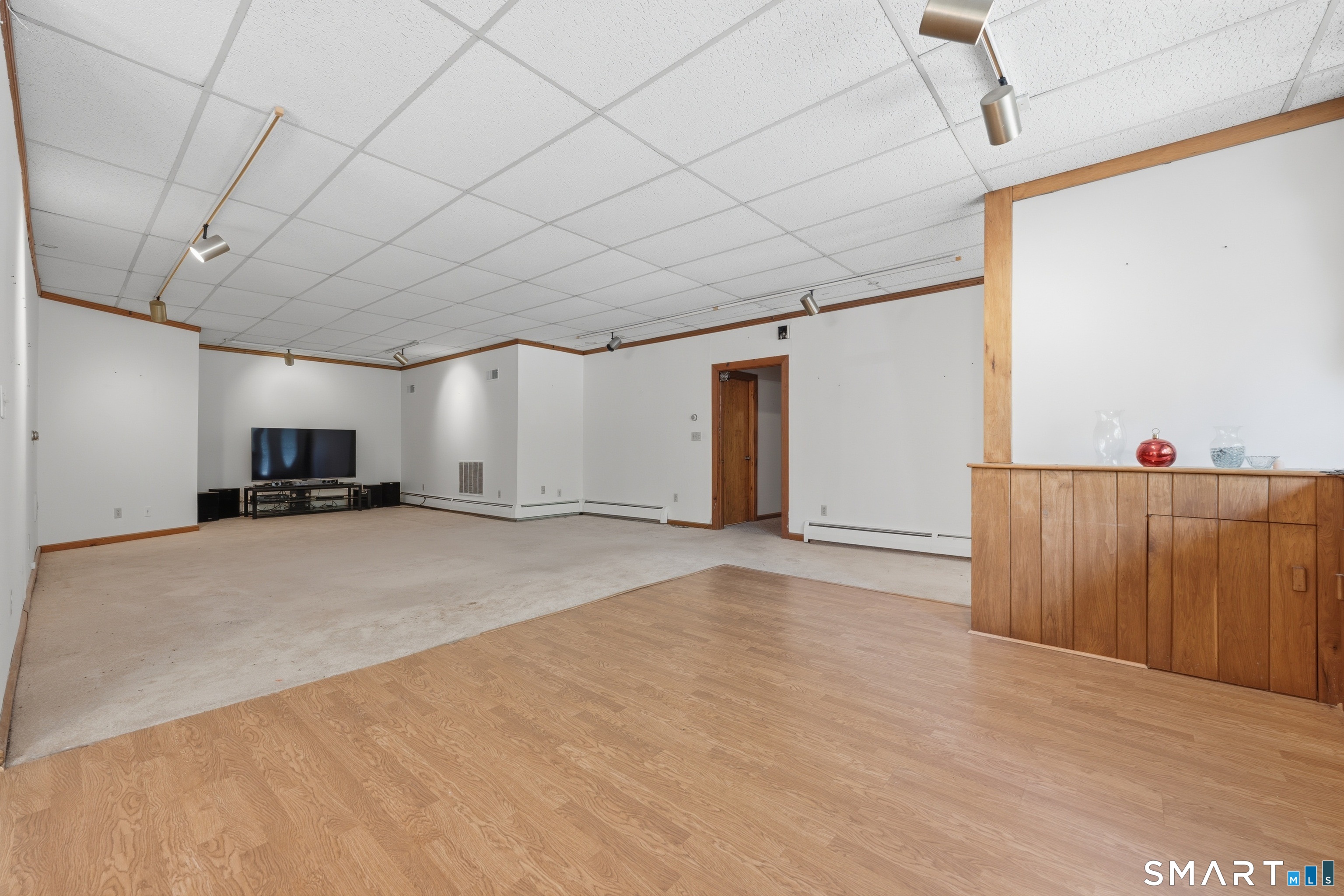 345 Rimmon Road Woodbridge, CT 06525 - Photo 6 of 40 First floor living/dining area