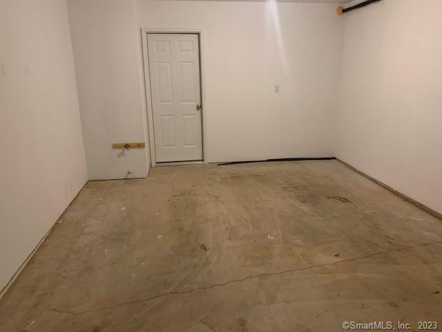 27 Tridell Drive, Unit 14 Plantsville, CT 06479 - Photo 10 of 12 a view of an empty room