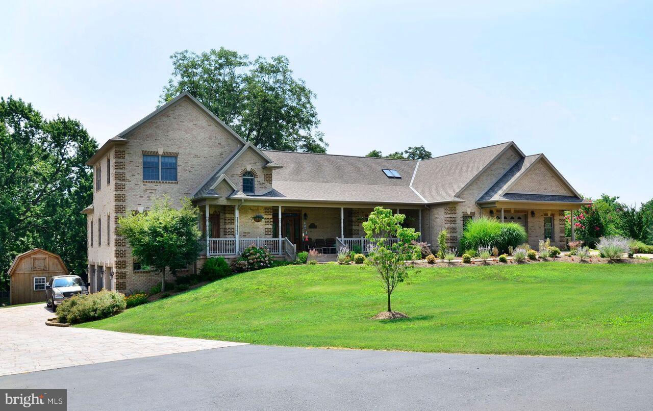 All Brick with Stamped Concrete Driveways